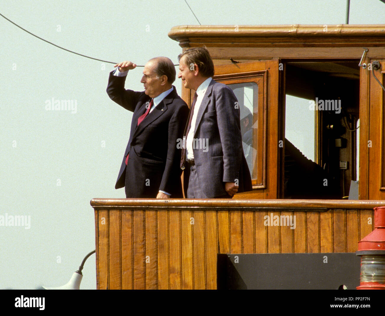 FRANCOIS MITTERAND President of France on a ship`s bridge with Swedish Prime minister Olof Palme during State visit to Sweden Stock Photo